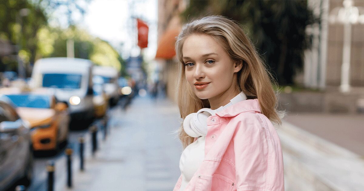 Young woman looking ahead as she thinks about how to tell her parents she’s pregnant.